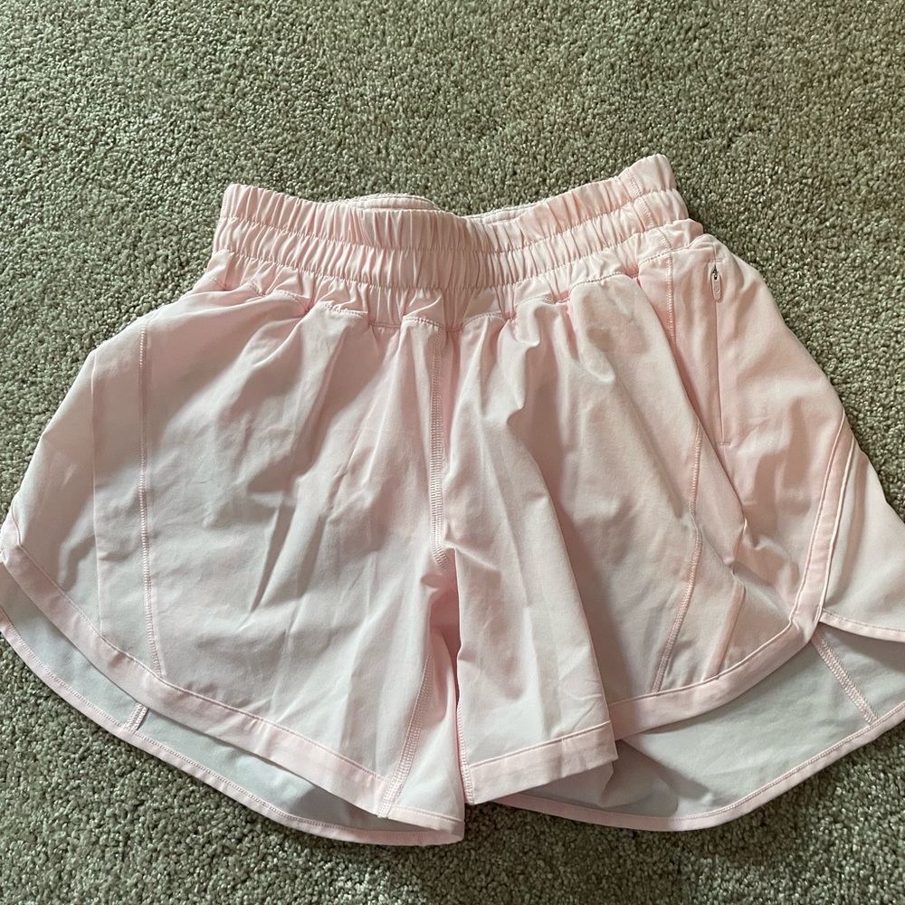 Pink lululemon track that shorts